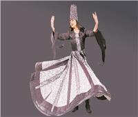 راقصة «مولوية» بألوان الشال الفلسطينى