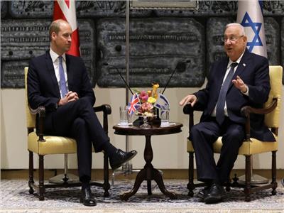 الرئيس الإسرائيلي رؤوفين ريفيلن  والأمير البريطاني وليام - رويترز