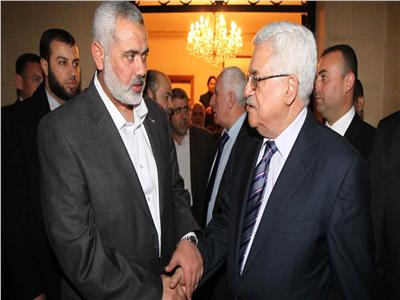 الرئيس الفلسطيني محمود عباس وإسماعيل هنية