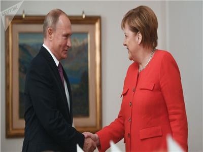 الرئيس الروسي فلاديمير بوتين و المستشارة الألمانية أنجيلا ميركل