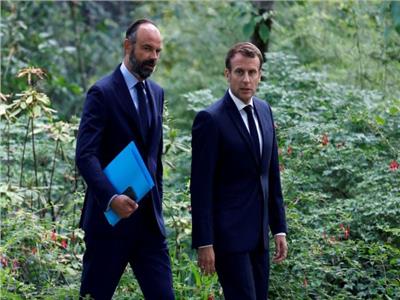 الرئيس الفرنسي ايمانويل ماكرون و رئيس الوزراء إدوارد فيليب - رويترز