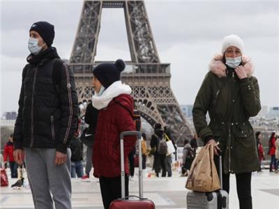 فرنسا تستعد لفرض الكمامات في الأماكن العامة