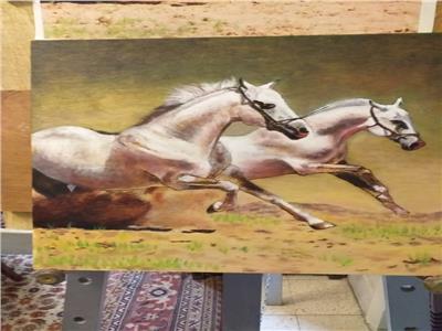 احدى لوحات معرض الحصان شريك وصديق