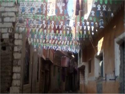 زينة رمضان تملأ شوارع القرية في المنيا   