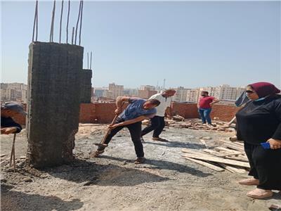 إيقاف بناء شبكة محمول أعلى مصنع ملابس شرق الإسكندرية