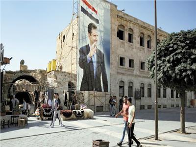  لافتات التأييد لإعادة انتخابات بشار الأسد على كل مبانى المدن السورية