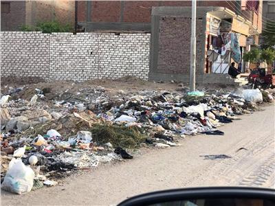  أكوام القمامة تغزوا شوارع مركز الغنايم