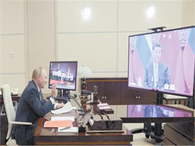 بوتين أثناء اجتماع افتراضى مع نظيره الصينى 