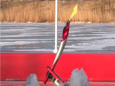 روبوتات تحمل شعلة دورة الألعاب الأولمبية الشتوية