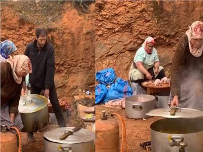 نساء قرية ريان يتطوعن لاعداد الطعام من أجل فرق الانقاذ 