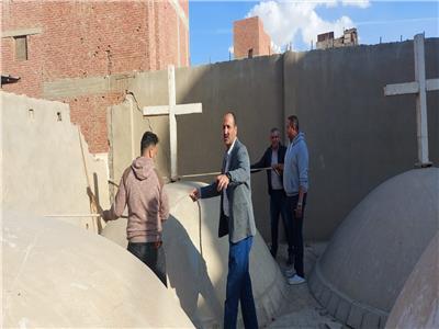 لكونه مصدر خطورة إزالة جدار كنيسة آيل للسقوط في بني سويف