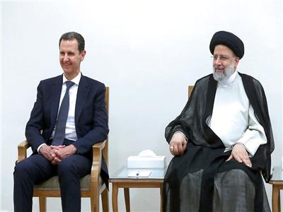 الرئيس السوري بشار الأسد ونظيره الإيراني إبراهيم رئيسي