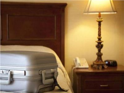 جثة تحت سريرسائح صيني في فندق