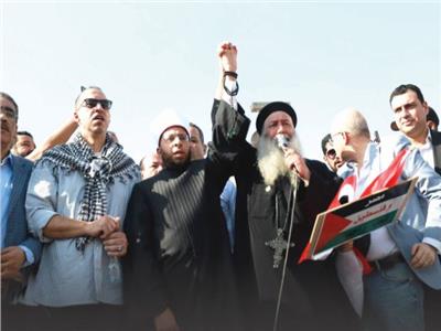  د. أسامة الأزهري خلال مشاركته فى المسيرة الحاشدة أمام النصب التذكارى