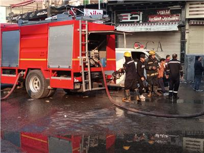 المعمل الجنائي يعاين حريق «محطة أتوبيس» في بولاق الدكرور