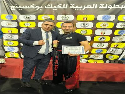 أيمن عامر مع رئيس الاتحاد المصري للكيك بوكسينج 