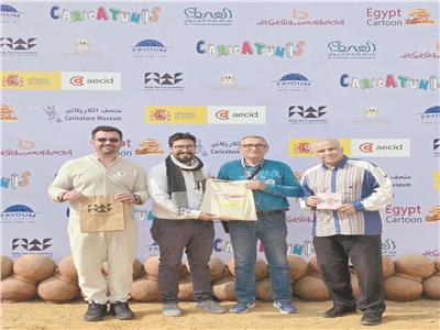 الفائزون فى مسابقة فن الكاريكاتير بالفيوم