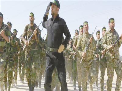 استعراض سابق لأحد فصائل الحشد الشعبى العراقى
