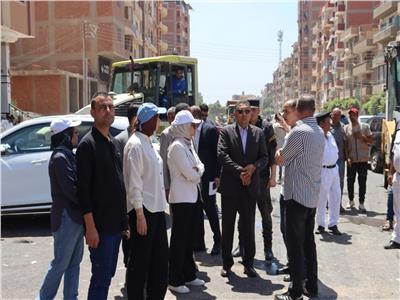 رصف وتطوير شارع الحرية أمام مستشفى القناطر العام 