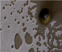 ناسا تكشف عن صور مذهلة لكهوف وحفر المريخ