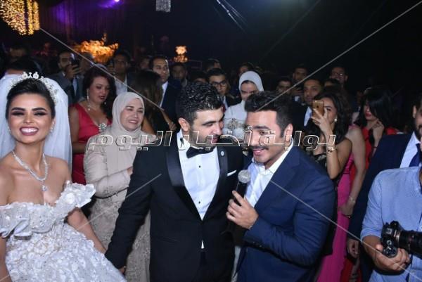 فنانون ورياضيون يحتفلون بزفاف فرح علي.. وتامر حسني يُشعل الحفل