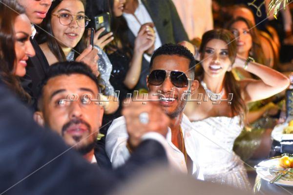 الهضبة ودينا الشربيني وراغب ومحمد رمضان في زفاف «باسل سماقية»