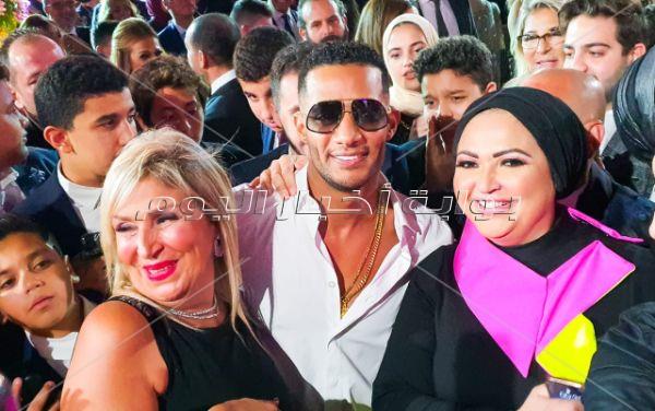 الهضبة ودينا الشربيني وراغب ومحمد رمضان في زفاف «باسل سماقية»