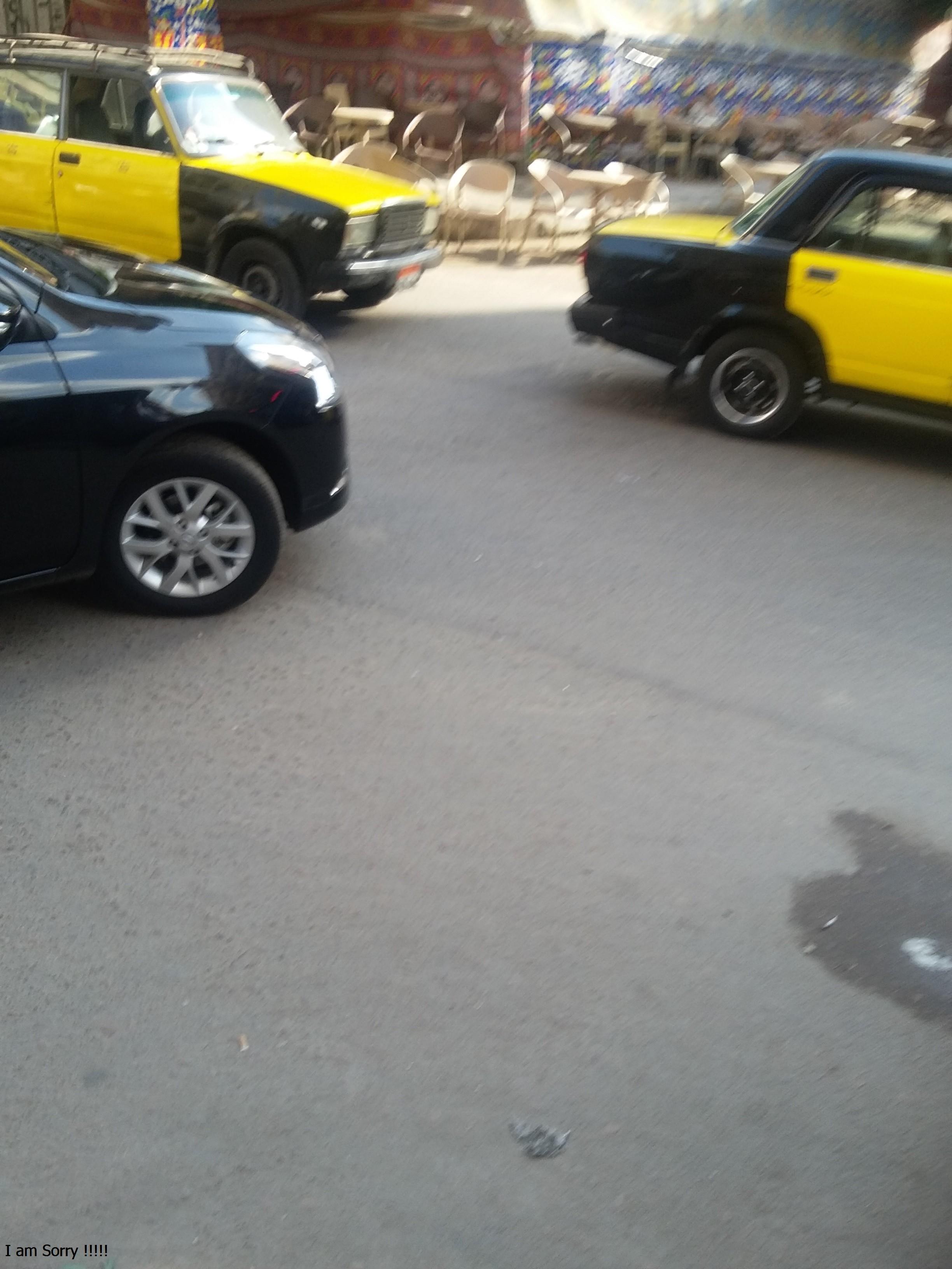 إحتلال المقاهى و الباعة الجائلين للأرصفة 
