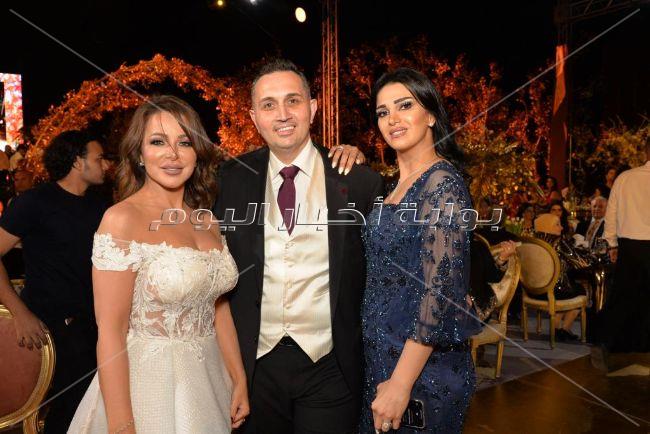 الهضبة ودينا الشربيني وراغب ومحمد رمضان في زفاف «باسل سماقية»