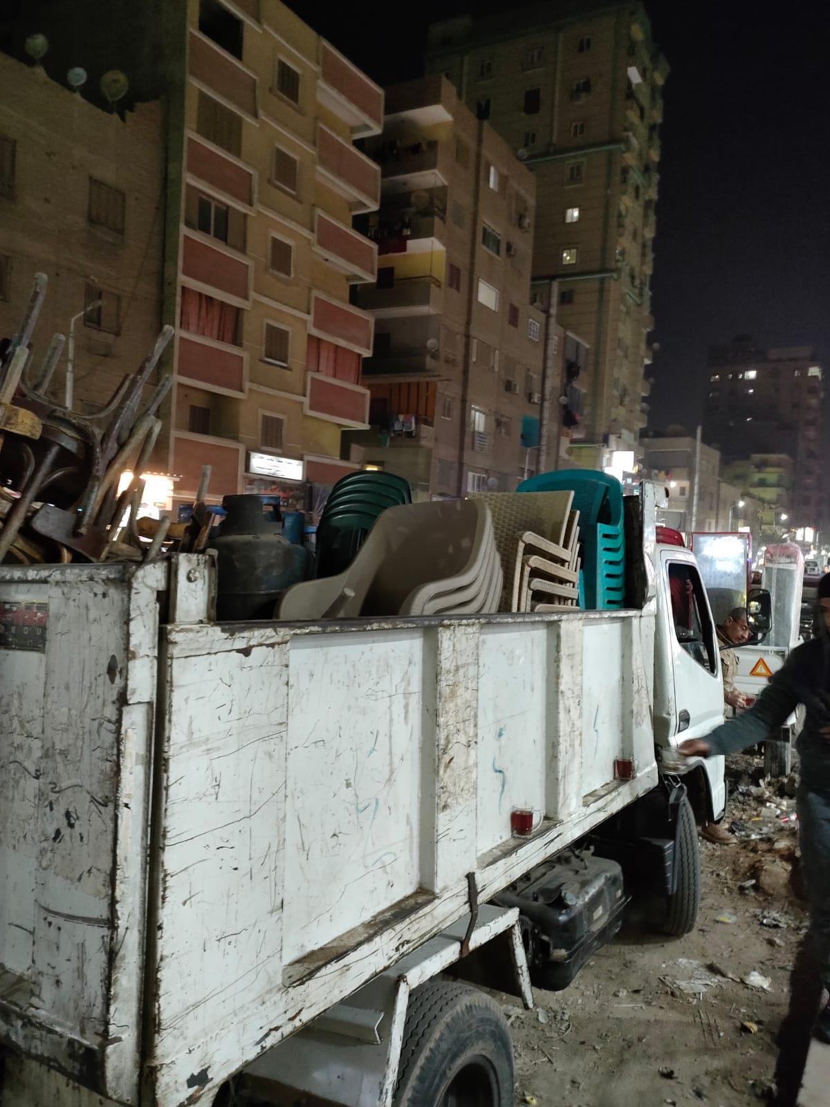 مصادرة 150 حالة إشغال طريق بشوارع بولاق الدكرور
