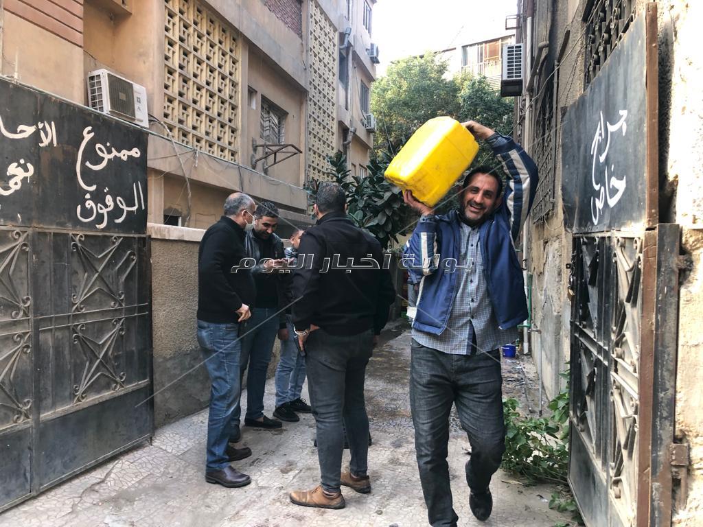 ضبط شقة سكنية تم تحويلها إلى مطبخ ومخزن بالدقي