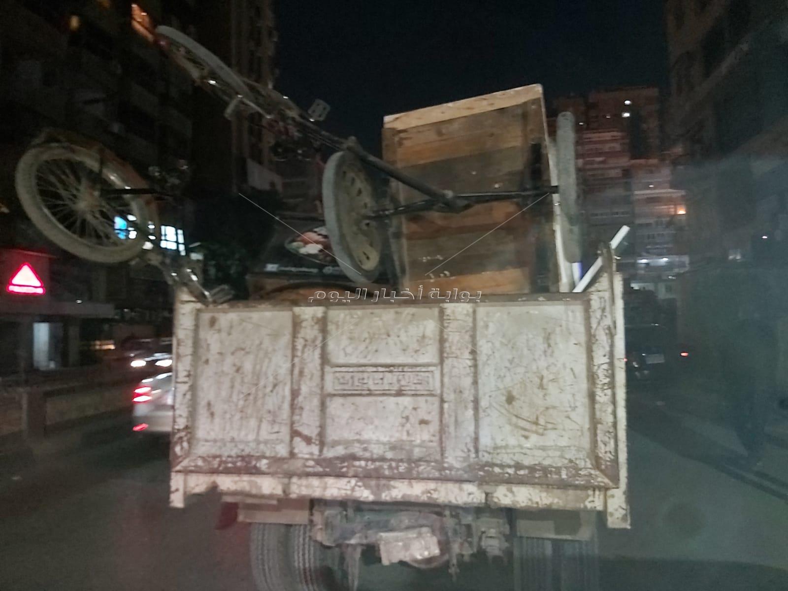  رفع 143 حالة إشغال وتحرير 8 محاضر خلال حملة إنضباط بالدقي| صور