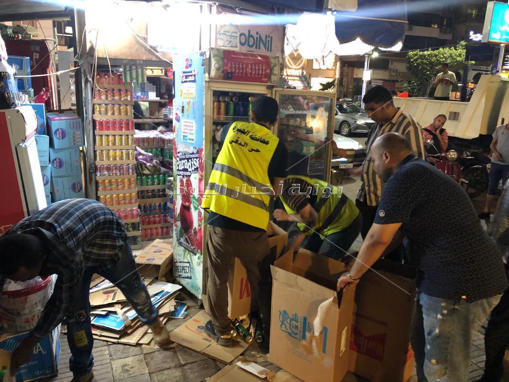 رفع إشغالات وكلبشة سيارات مخالفة في حملة موسعة بحي الدقي