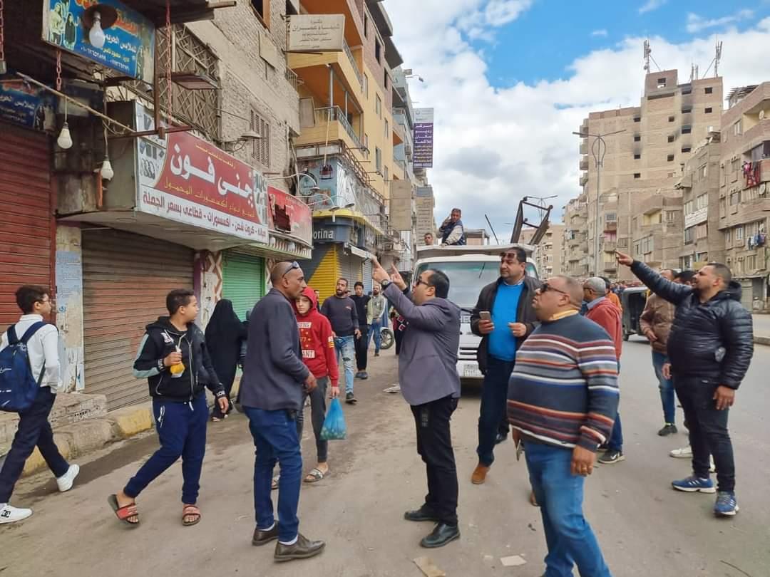 رفع 1000 حالة إشغال للمنشات التجارية و كلبشة 15 سيارة مخالفة للانتظار بالطالبية|صور  
