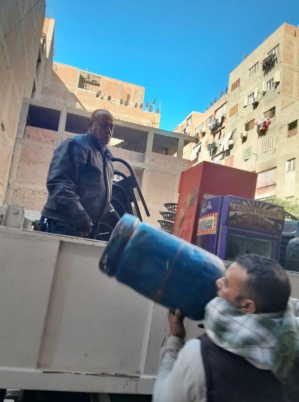 جانب من حملات ازالة الاشغالات ببولاق الدكرور