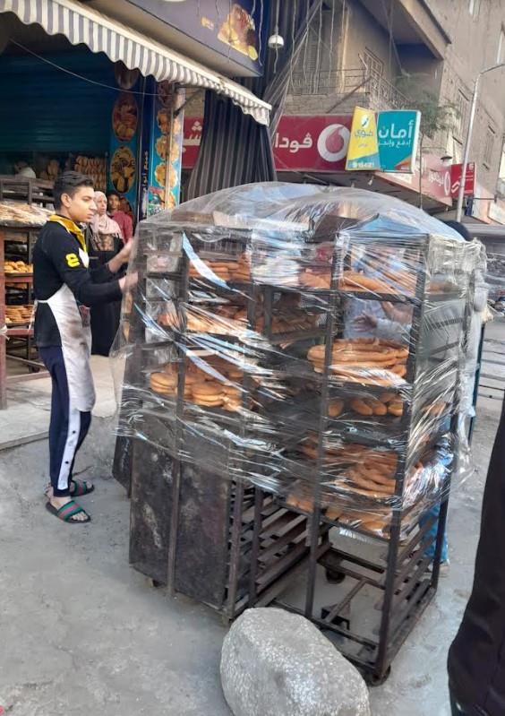 جانب من حملات ازالة الاشغالات ببولاق الدكرور
