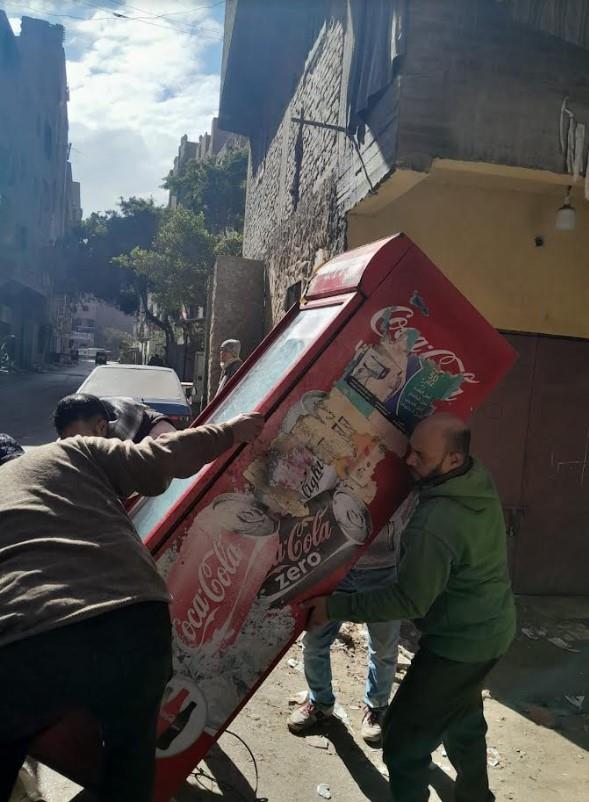 جانب من حملات ازالة الاشغالات ببولاق الدكرور
