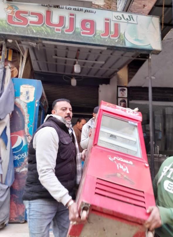 جانب من حملات ازالة الاشغالات ببولاق الدكرور