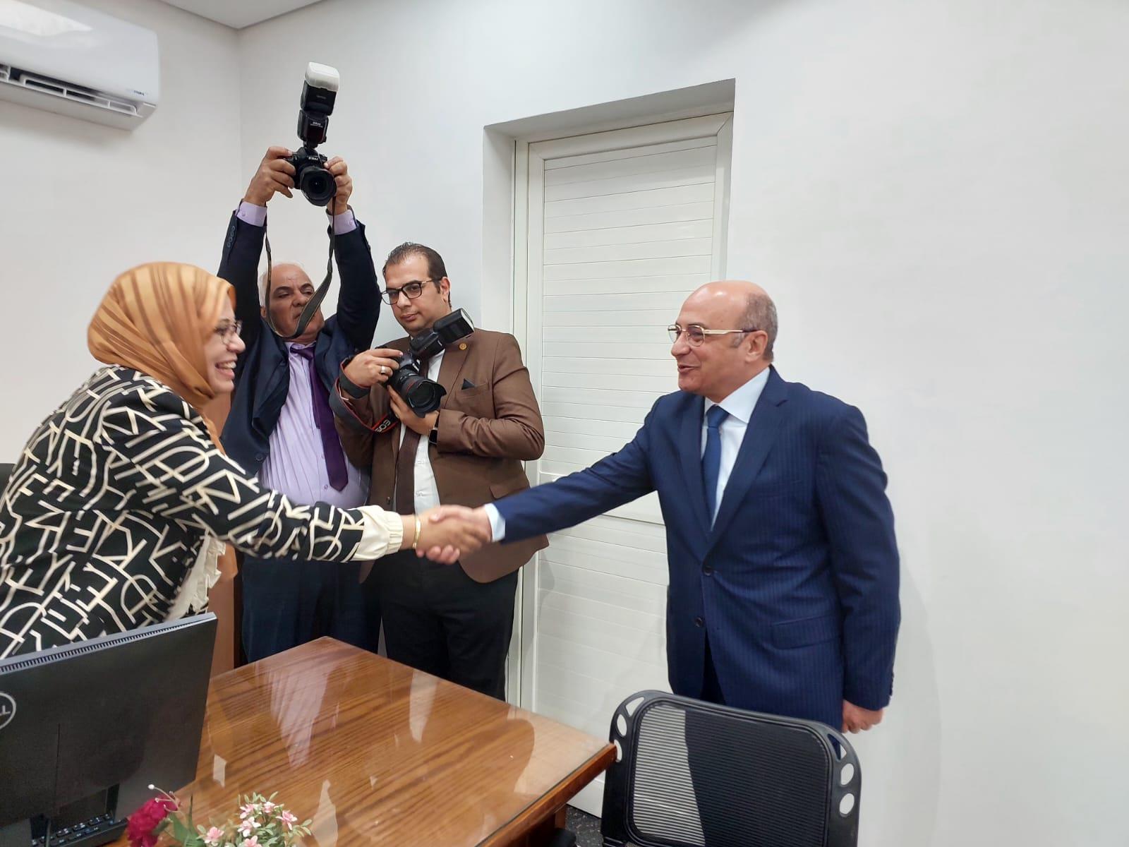 المستشار عمر مروان- وزير العدل والدكتور عاصم الجزار- وزير الإسكان وجانب من الافتتاح