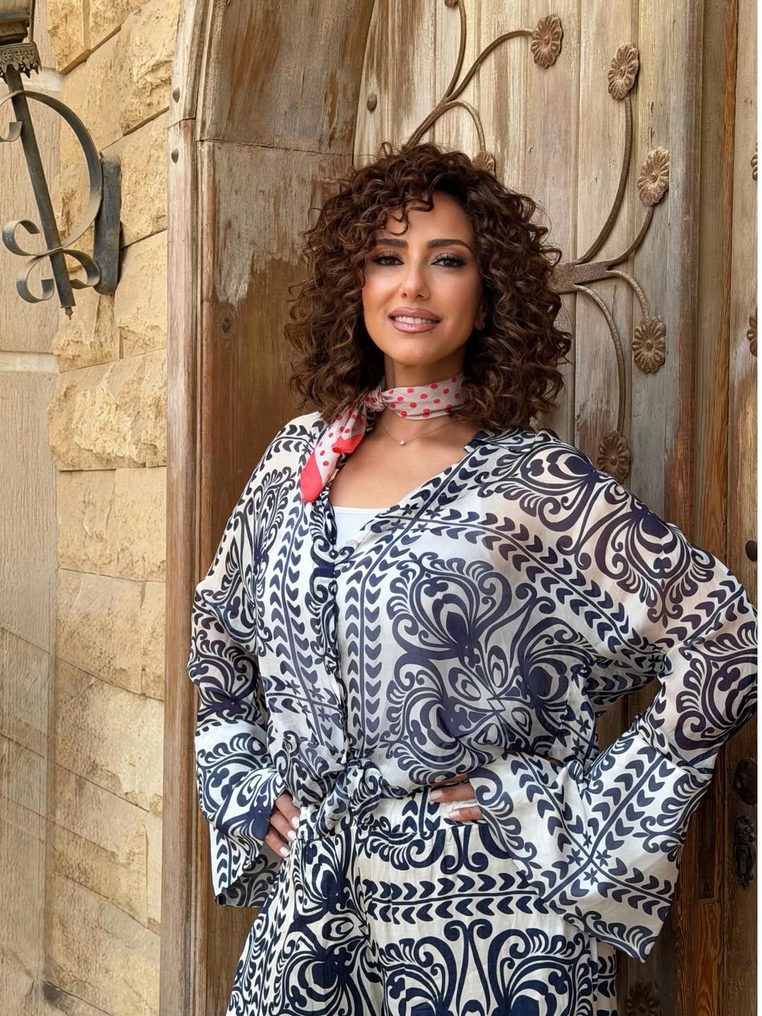 حنان مطاوع تطل على محبيها في العيد بفستان أبيض مشجر