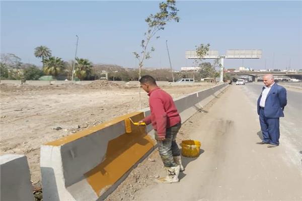 تجميل ودهان مطالع ومنازل الطريق الدائرى بمسطرد