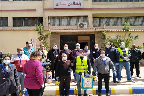  تطهير مواقف الاتوبيس وسيرفيس ودورات المياه العامة  بحي البساتين لمواجهة كورونا