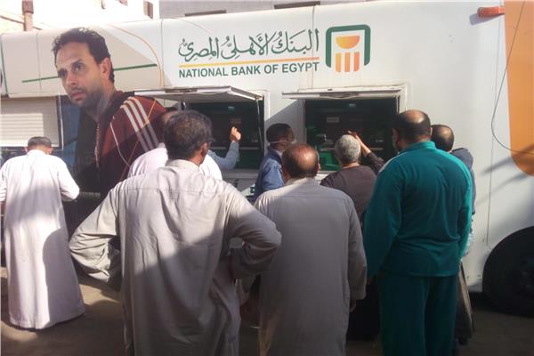 ماكينات صرف متحركة من البنك الاهلي 