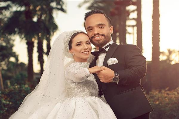 عبد الرحمن ومنار خلال حفل زفافهما