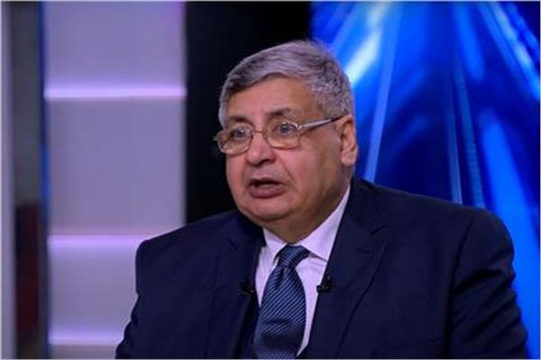  الدكتور محمد عوض تاج الدين