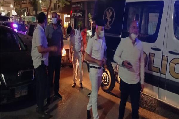 حملة حي الدقي لضبط مواعيد الحظر والغلق