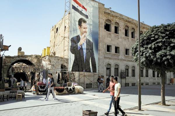  لافتات التأييد لإعادة انتخابات بشار الأسد على كل مبانى المدن السورية