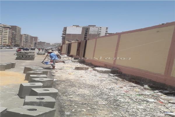 رصف شارع ترسا وتوحيد ألوان العمارات