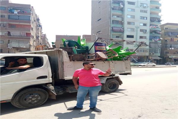 حملة إشغالات وكلبشة السيارات المخالفة في بولاق الدكرور| صور