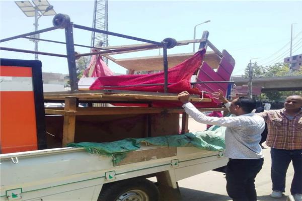 إزالة 39 إشغال وإعلانات بكوم أمبوومصادرة 20 طن مواد بناء 